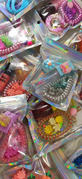 Bolsa con accesorios y gloss✨